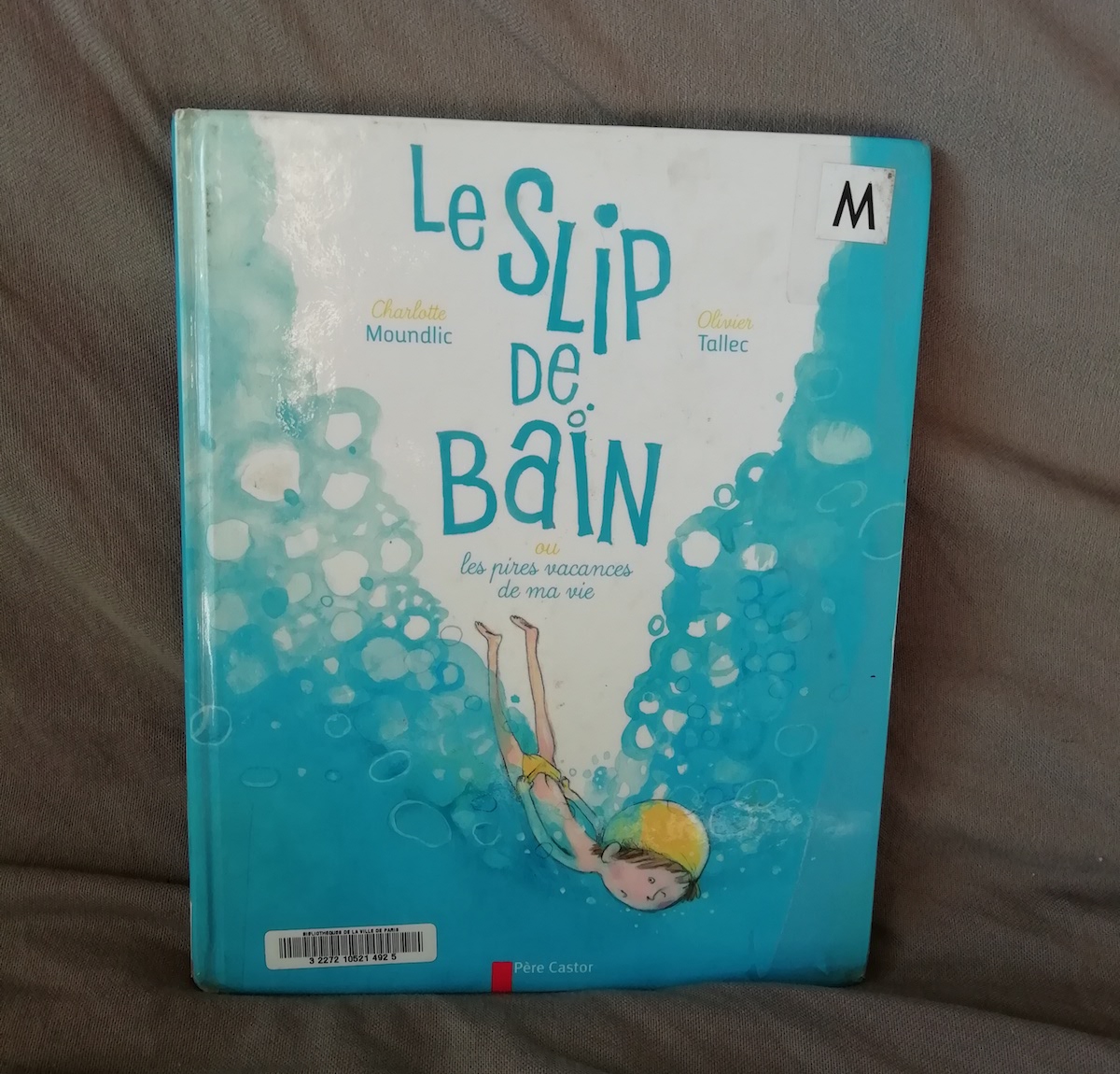 Le slip de bain couverture
